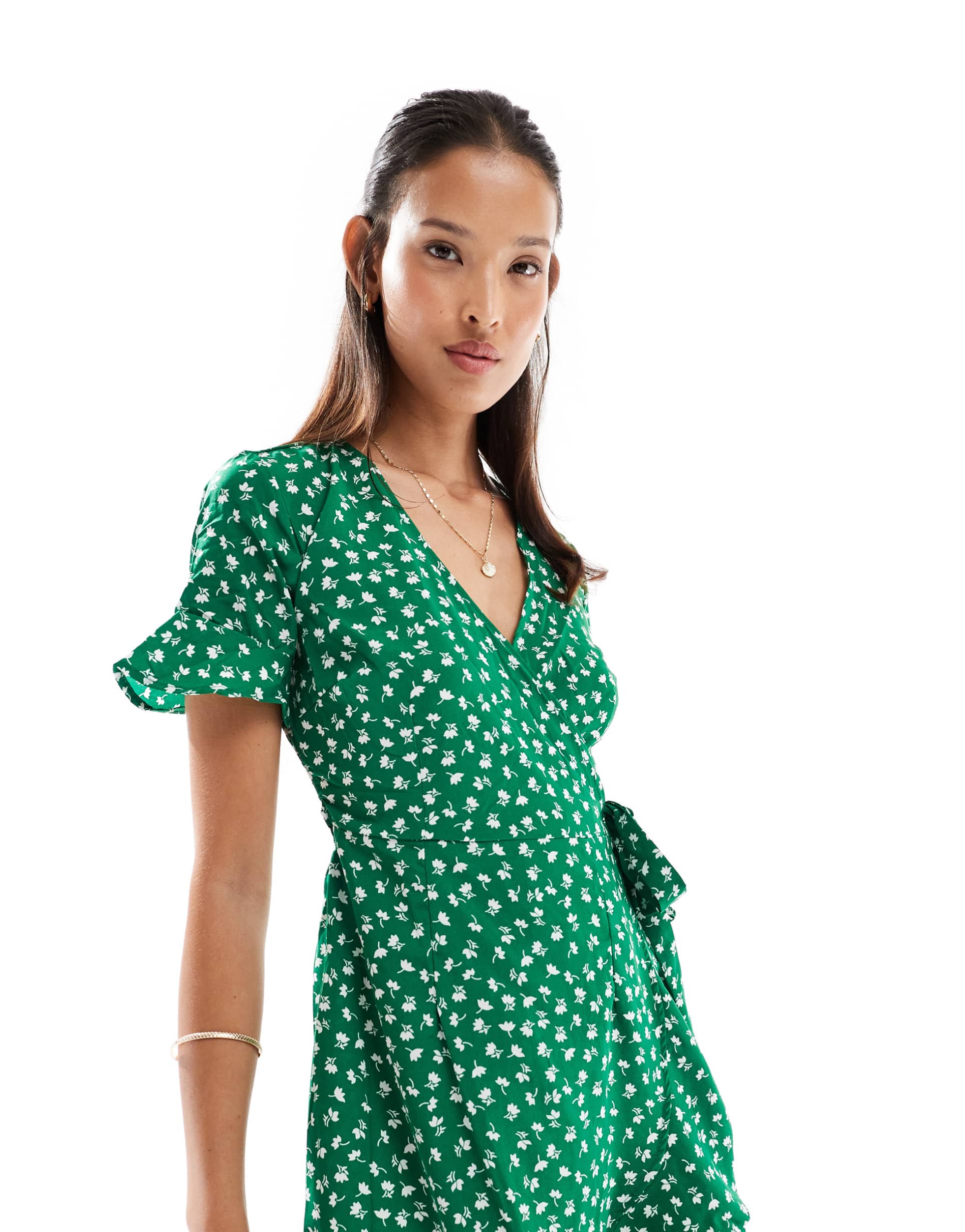 only frill wrap mini dress in green ditsy floral