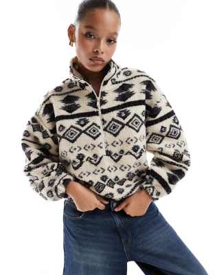 half zip fleece in off white and black