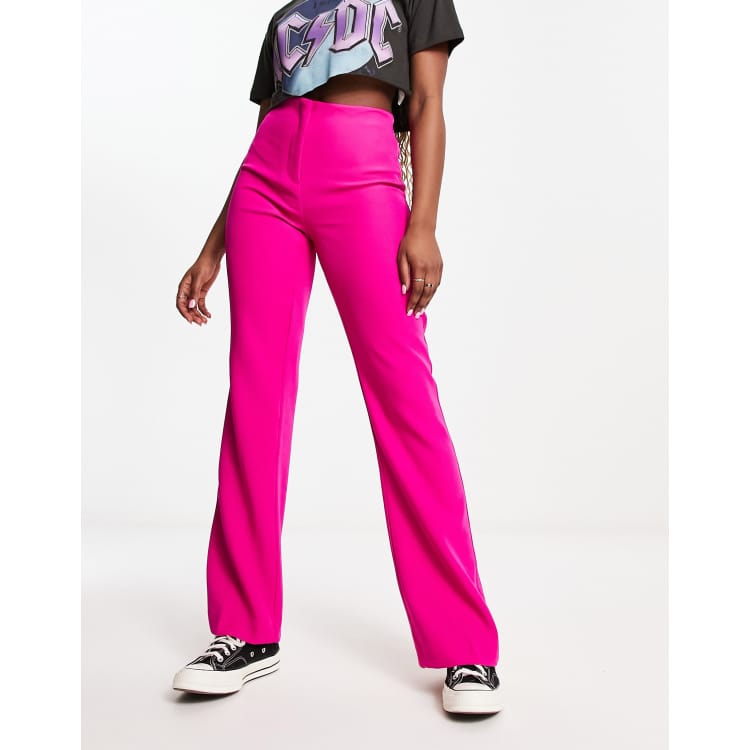 Only high rise flared pants in bright pink - part of a set