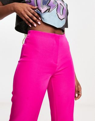 Only high rise flared pants in bright pink - part of a set