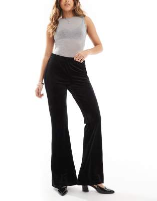 high waisted flared velvet pants in black