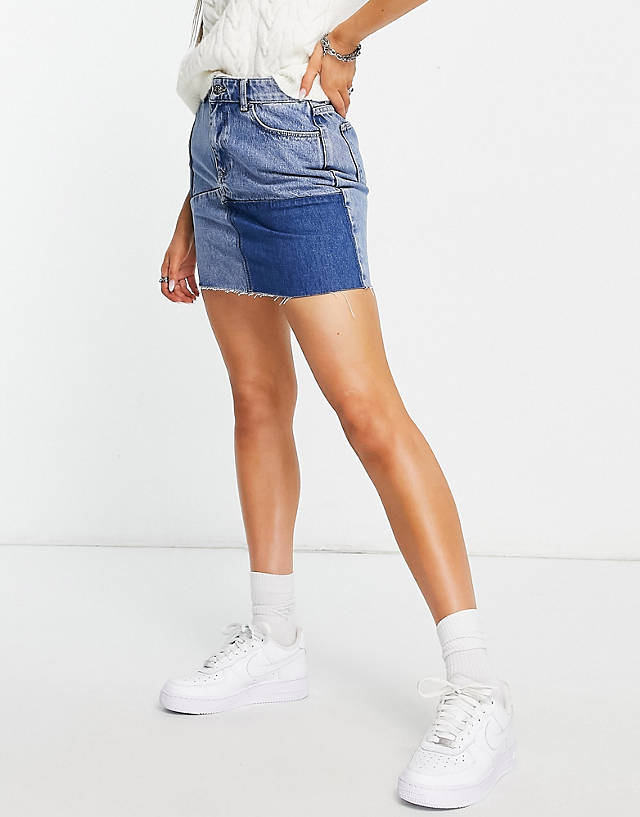 ONLY - high waisted patchwork denim mini skirt in mid blue wash