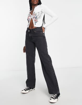 Only high waisted wide leg jeans with uneven closure in
