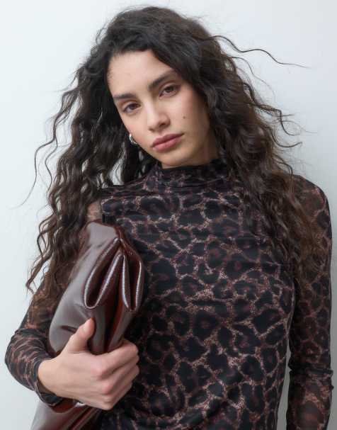 ONLY hochgeschlossenes Langarm-Mesh-Top mit transparenten Ärmeln im Leopardenmuster - view 1