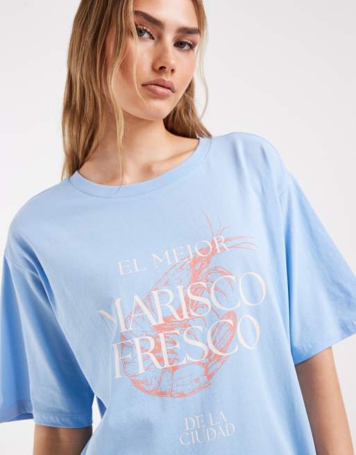 ONLY – Jasnoniebieski T-shirt oversize z grafiką z owocami morza, 3 z 4