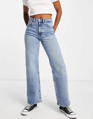 Juicy low waist wide leg jean in mid blue wash