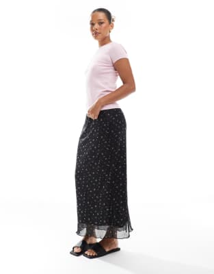 lettuce edge maxi skirt in black ditsy print