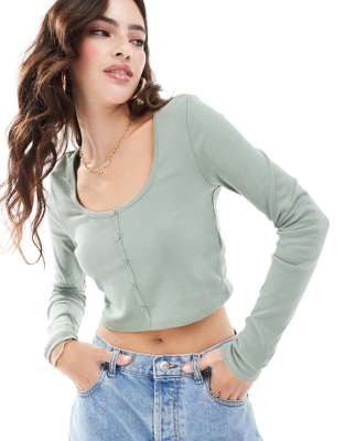 long sleeve button through top in sage-Green