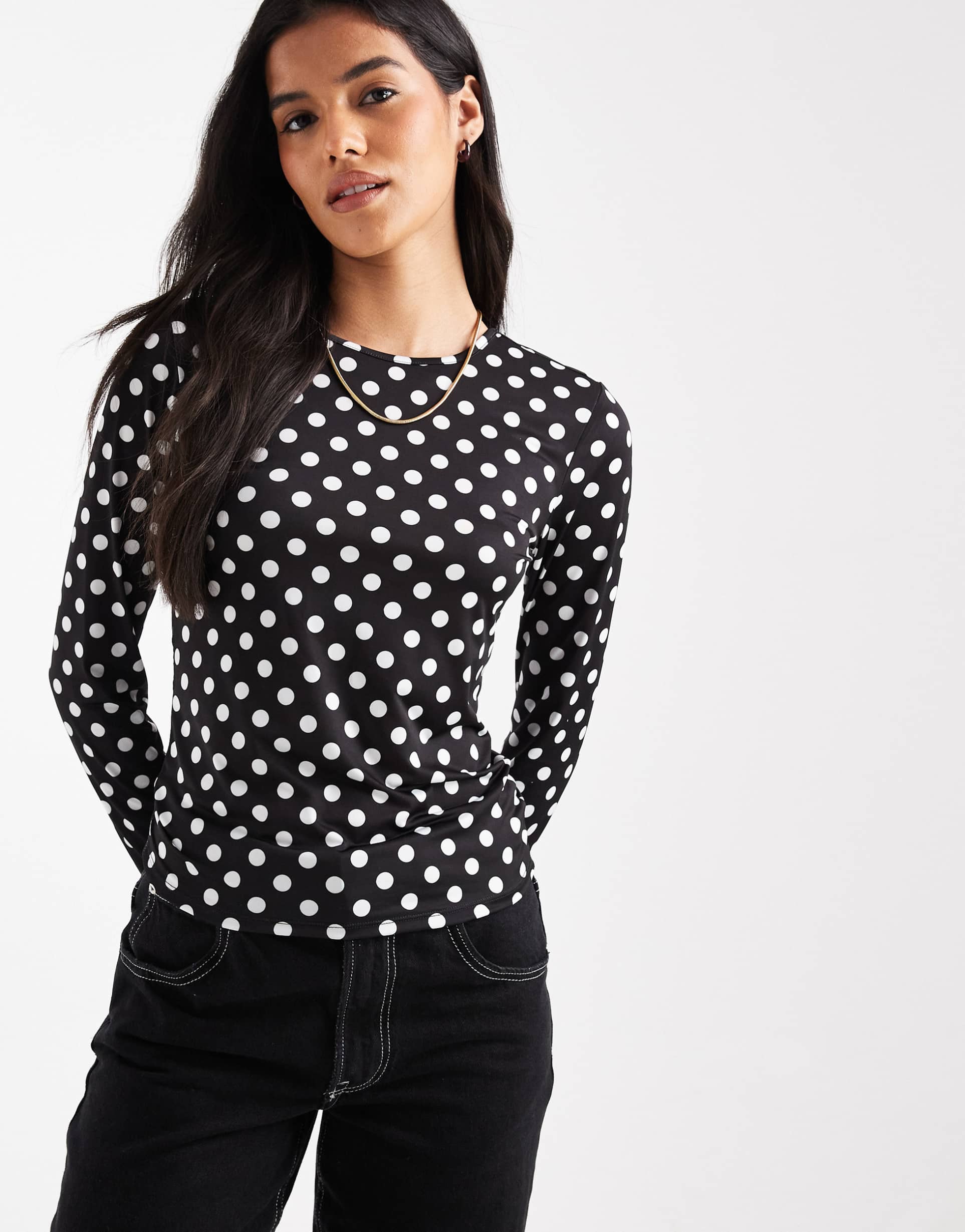 only long sleeve top in black with white polka dots