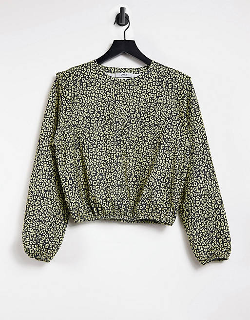 Only long sleeve top with strong shoulder in animal print