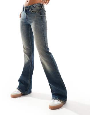 low rise flared jeans in vintage tint-Blue