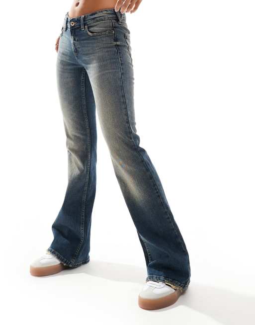 ONLY low rise flared jeans in vintage tint ASOS