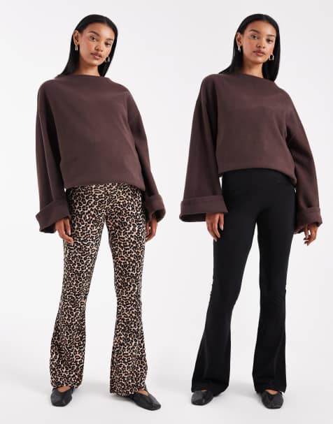 ONLY Maternity 2 pack of flare pants in black & animal print - view 1