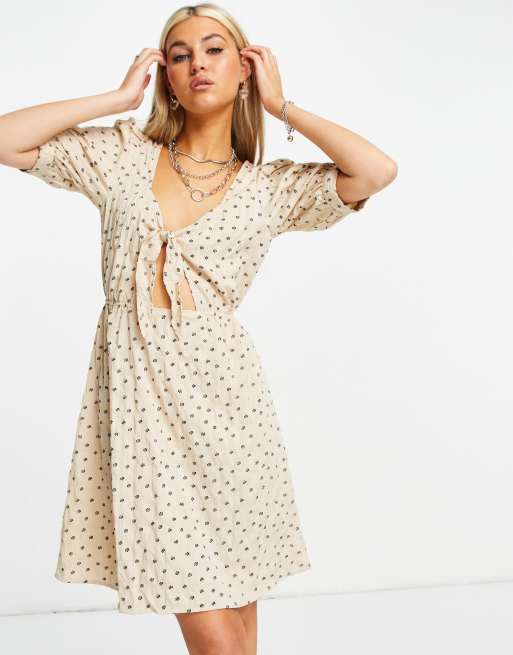 Only mini dress with tie front and cut out in whimsy floral