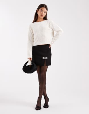 Mini-jupe avec naud à strass - Noir 34