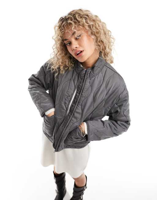 Only onion quilted jacket with oversized pockets in washed gray