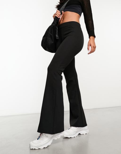 Pantalon évasé best sale noir taille haute