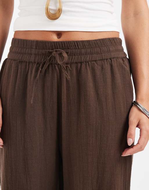 ONLY Petite - Broek met linnenlook en wijde pijpen in bruin, 3 van 5