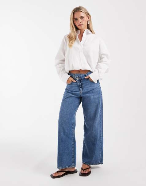 ONLY Petite – Hope – Mellanblå jeans med vida ben, medelhög midja och knappdetalj - view 1