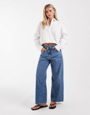 Only Petite Hope Mid Rise Wide Leg Jeans With Button Detail In Blue