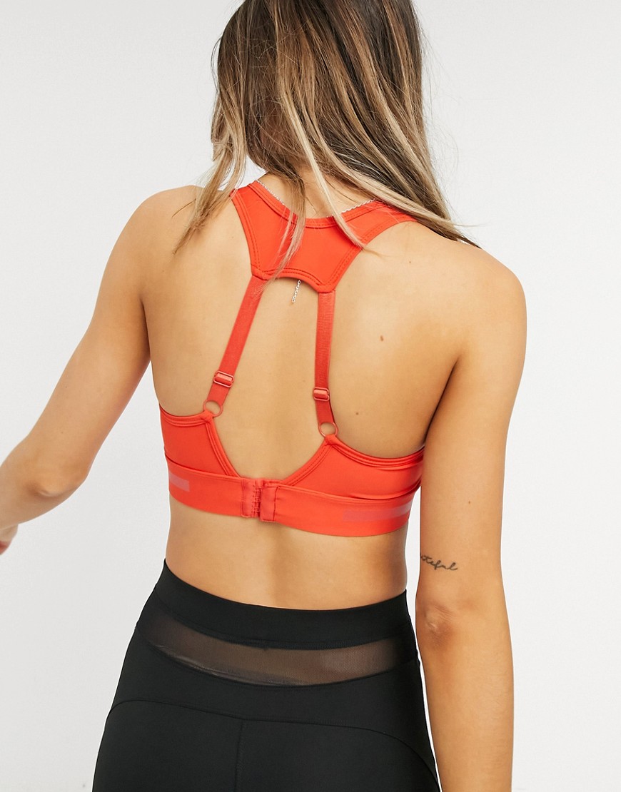 sports bra with back fastening in orange-Red