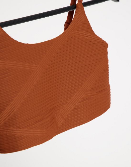 https://images.asos-media.com/products/only-play-textured-performance-sports-bra-in-rust-part-of-a-set/24518926-2?$n_550w$&wid=550&fit=constrain