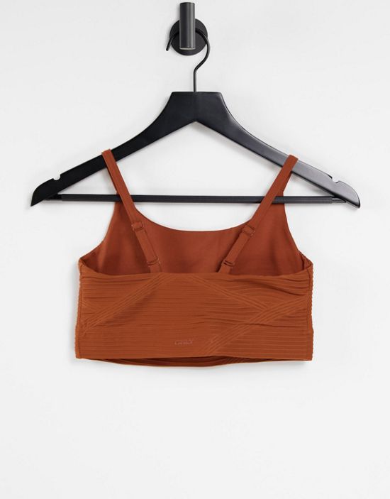 https://images.asos-media.com/products/only-play-textured-performance-sports-bra-in-rust-part-of-a-set/24518926-3?$n_550w$&wid=550&fit=constrain