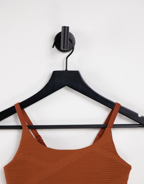 https://images.asos-media.com/products/only-play-textured-performance-sports-bra-in-rust-part-of-a-set/24518926-4?$n_550w$&wid=550&fit=constrain