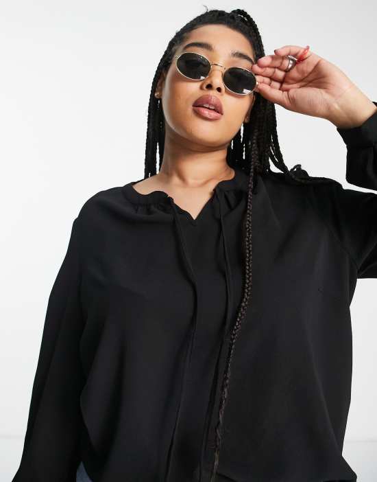 https://images.asos-media.com/products/only-plus-carnova-lux-long-sleeve-tie-neck-top-solid-in-black/201466989-4?$n_550w$&wid=550&fit=constrain