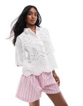 ASOS DESIGN sleeveless shirt with frill detail in cotton in