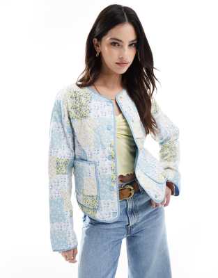 quilted jacket in blue patchwork print