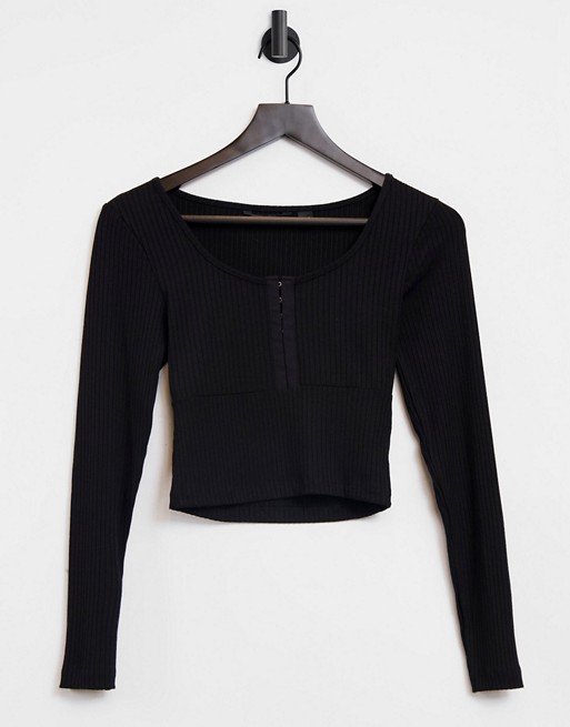 Only ribbed long sleeve top with hook and eye front in black