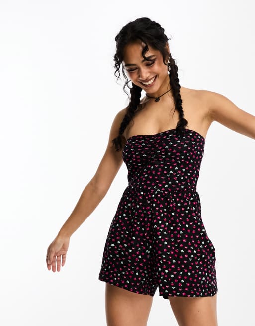 Only ruched front strapless romper in black and red ditsy floral