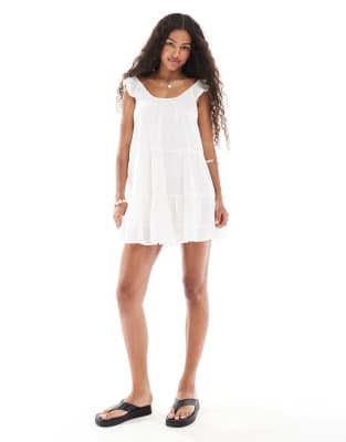 scoop neck tiered mini dress in white