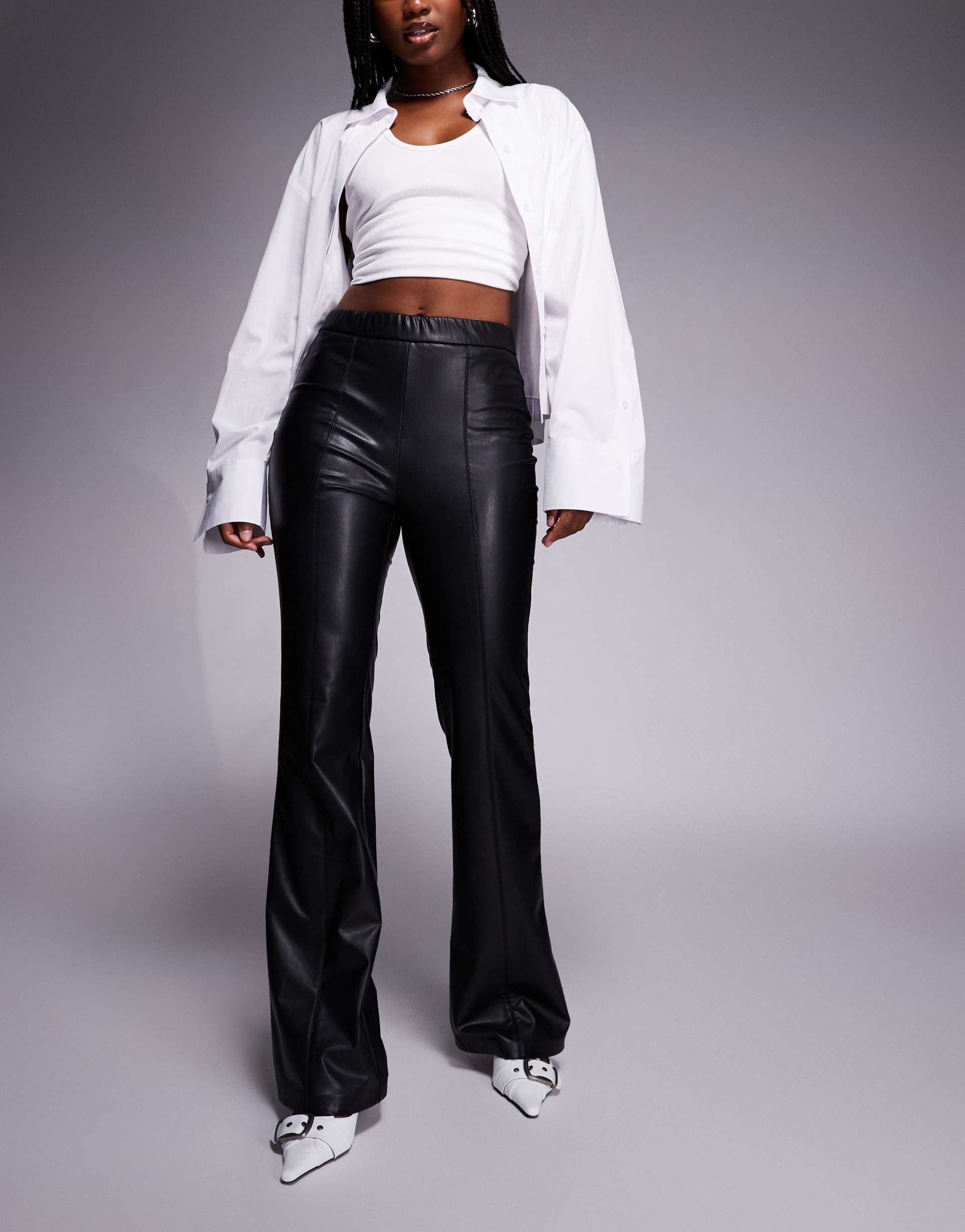 only seam detail faux leather flare pants in black