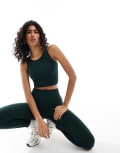 [ONLY] ONLY seamless top in dark green (part of a set) M-L Scarab
