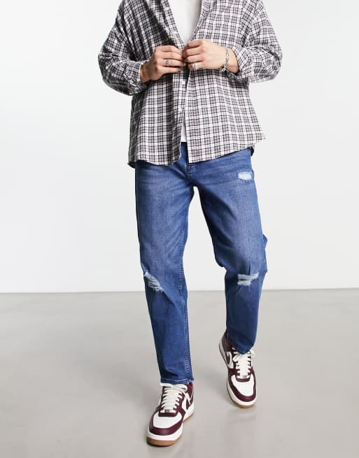 Tapered best sale jeans outfit