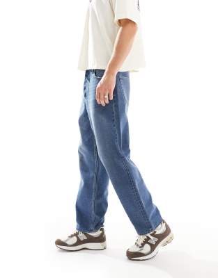 baggy fit jeans in mid blue wash