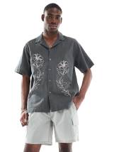ASOS DESIGN oversized washed cargo shirt in green