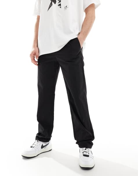 ONLY & SONS loose fit tech trouser in black - view 1