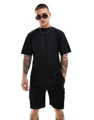 plisse oversized T-shirt in black - part of a set