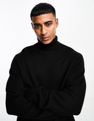 roll neck ribbed sweater in black