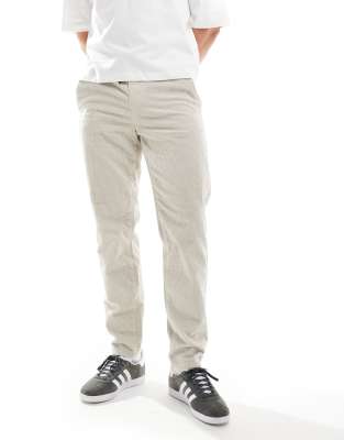 tapered corduroy pants in cream-White