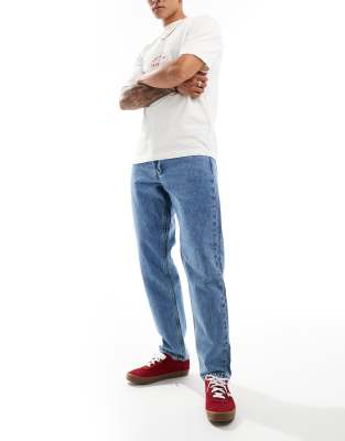 Tye loose tapered fit jeans in light blue wash