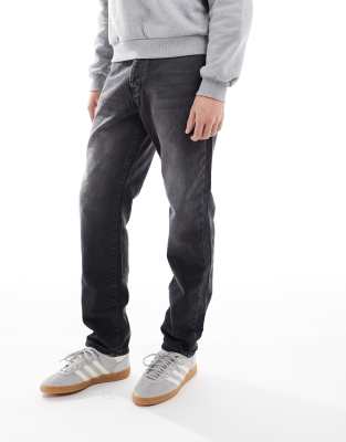 Yoke tapered fit jeans in washed black