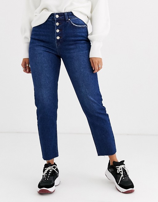 Only straight leg jean with exposed buttons in dark blue