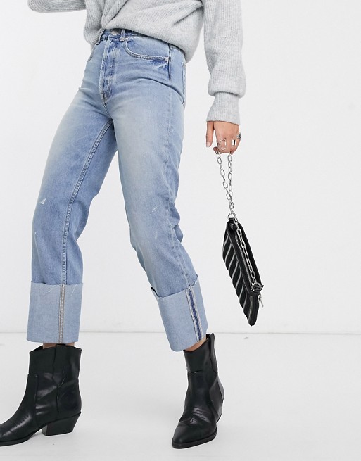 Only straight leg jeans with turn up hem detail in light blue wash