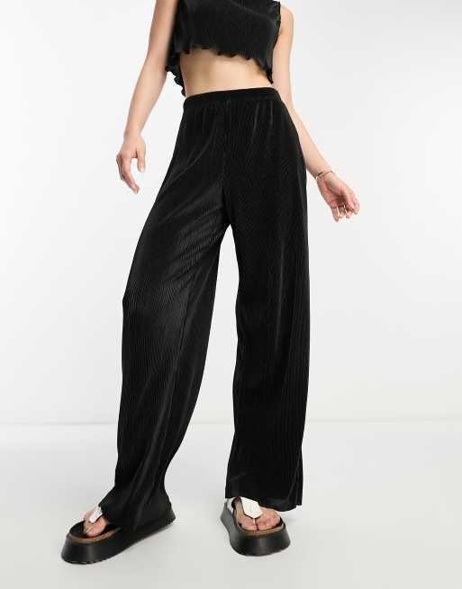 Only straight leg plisse pants in black - part of a set