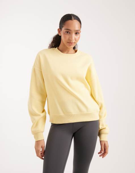 ONLY – Sweatshirt in Gelb mit überschnittenen Schultern und Rundhalsausschnitt - view 1