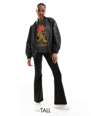 ONLY Tall flared trousers in black pinstripe